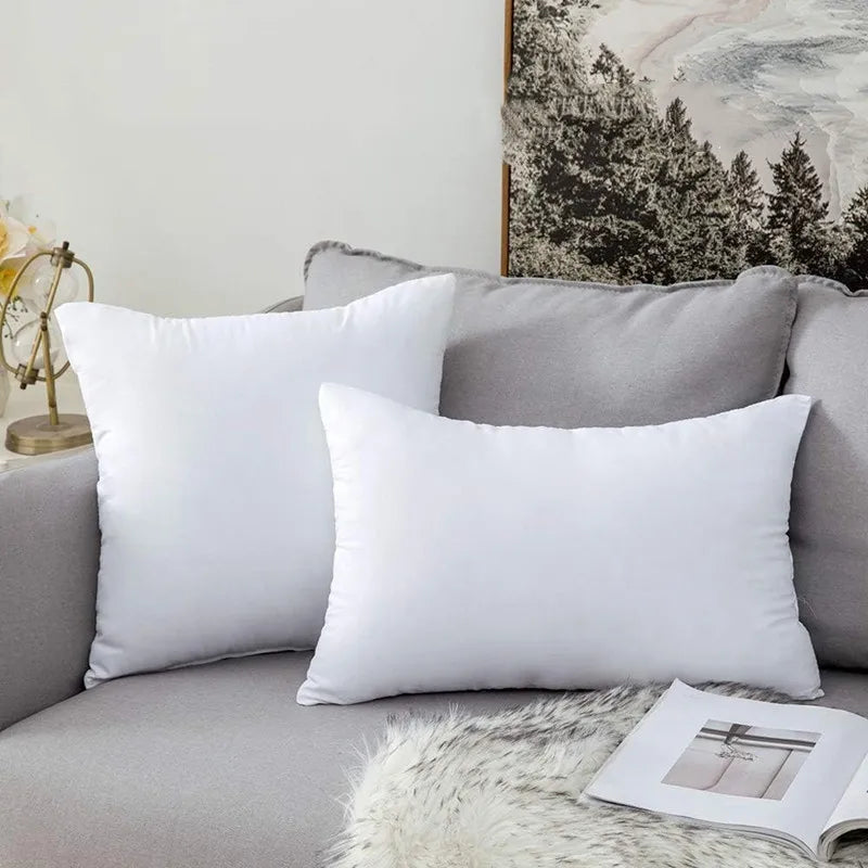 Coussin en tete de lit blanc